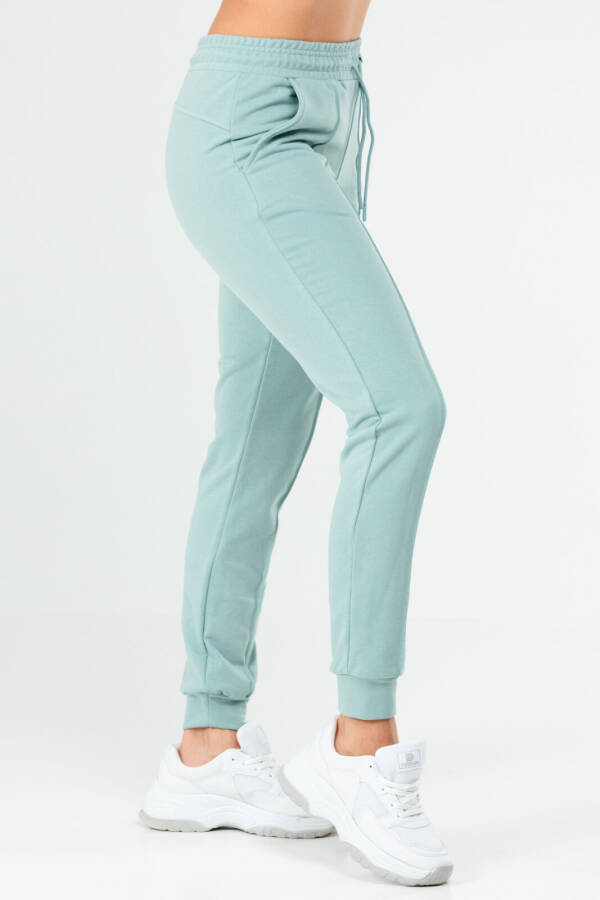 Çağla Yeşili Regular Pamuklu Yüksek Bel Manşetli Kadın Eşofman Alt sd0940 - Speedlife (1)